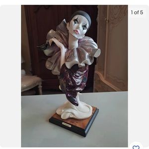 Armani clown statue .